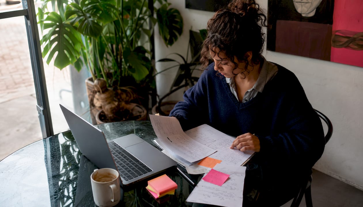 Female entrepreneur reviewing organic growth plans