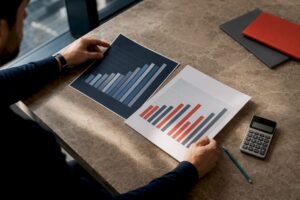 Analyst comparing ecommerce benchmark charts
