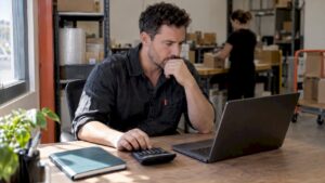 Ecommerce owner reviewing a marketing budget